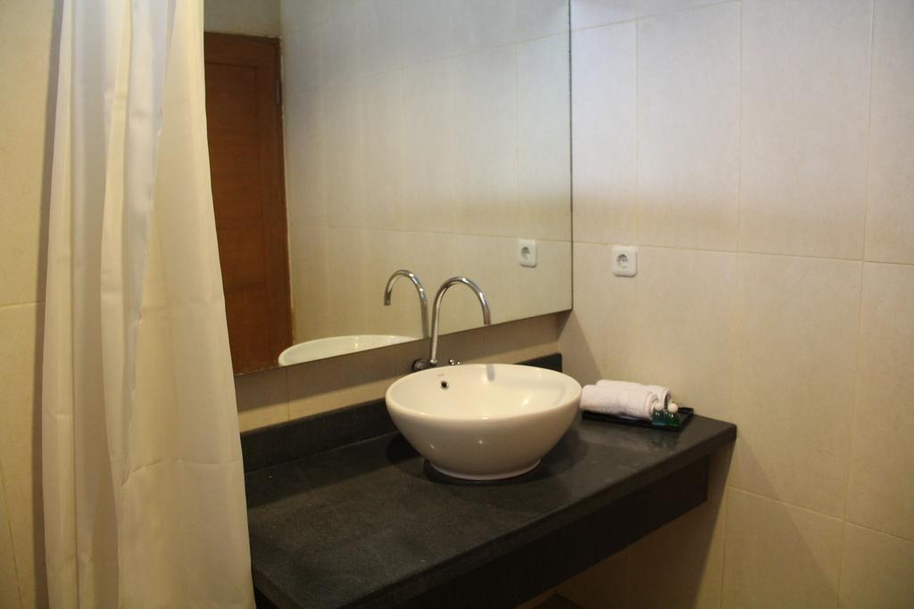 Kampoeng Nelayan Hotel Palu Rum bild