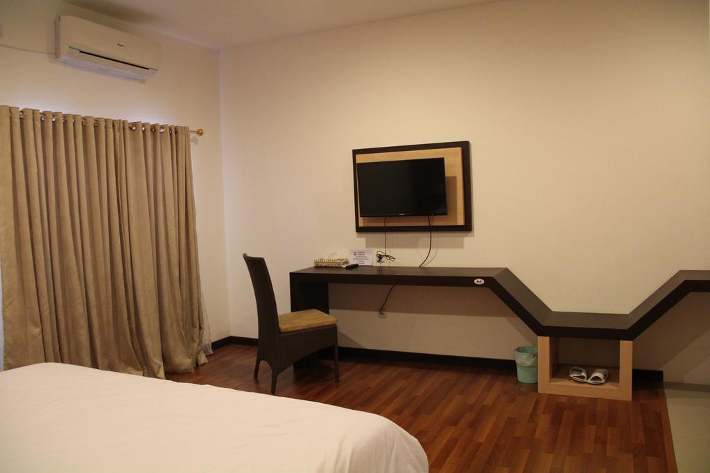 Kampoeng Nelayan Hotel Palu Rum bild